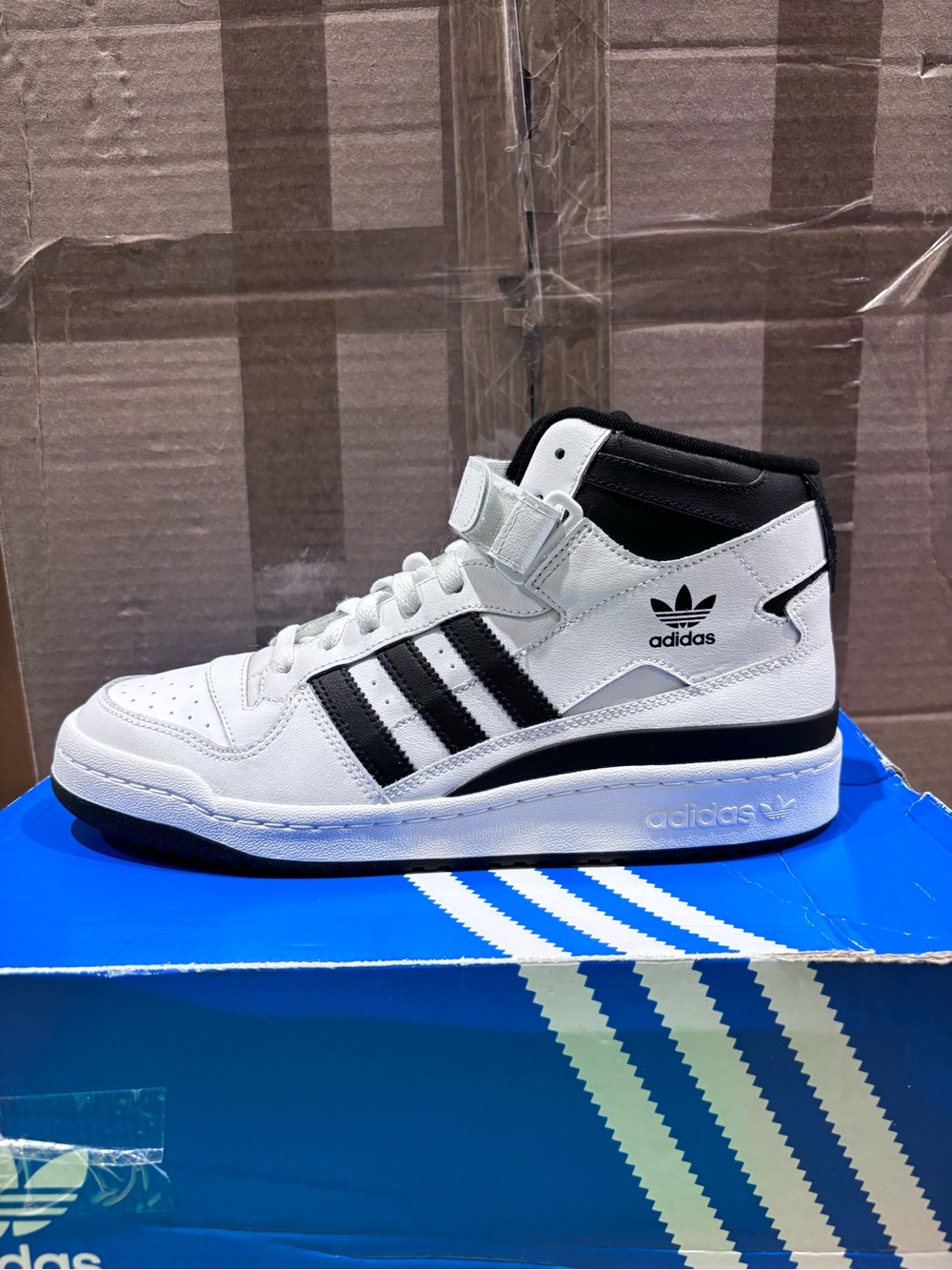 adidas Men’s White and Black Mid-Top Sneakers